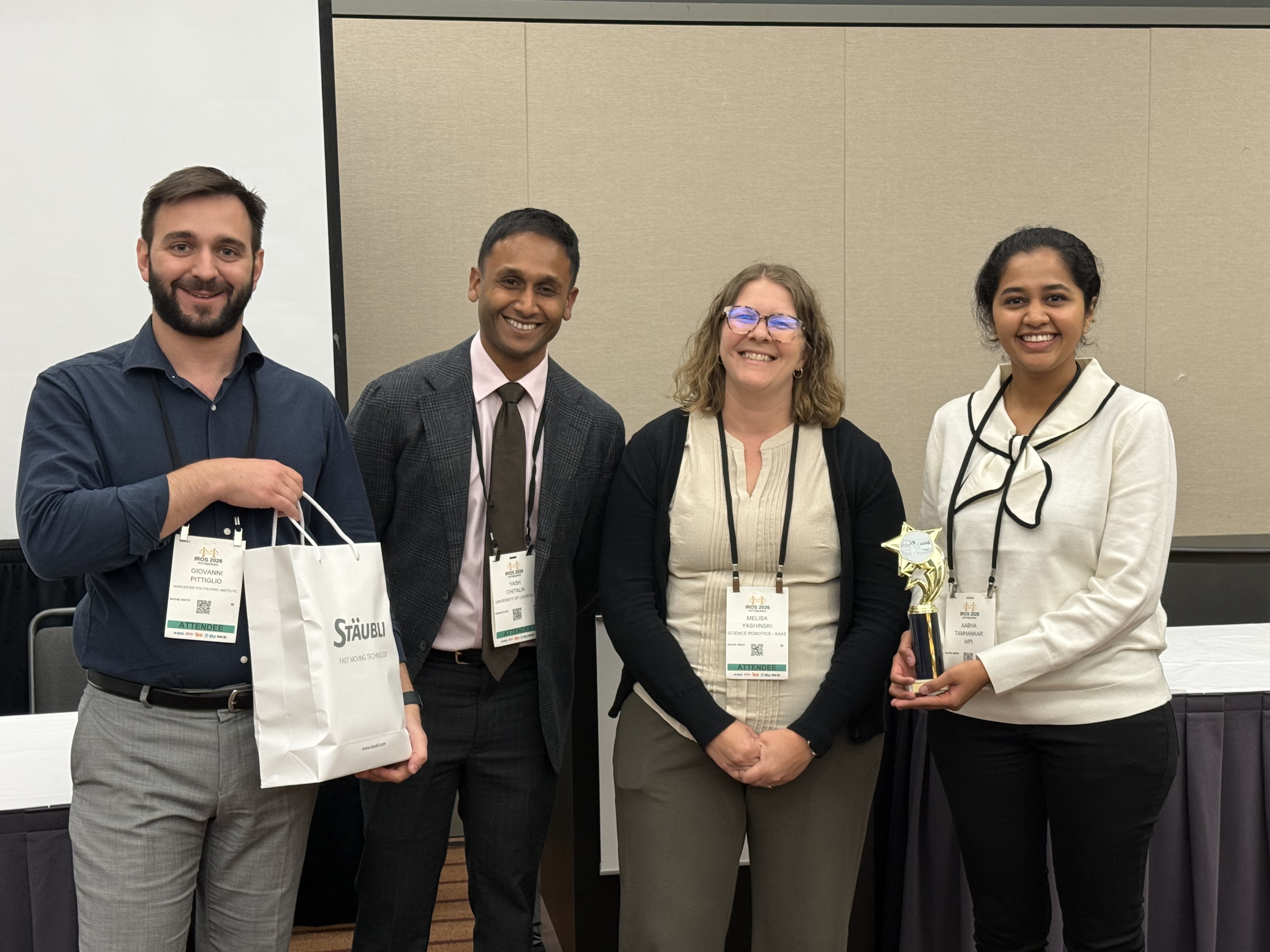 Gio and Aabha receiving the 1st Place Stäubli Future Medical Roboticist Award at IROS 2026.